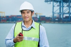 Construction worker using radio